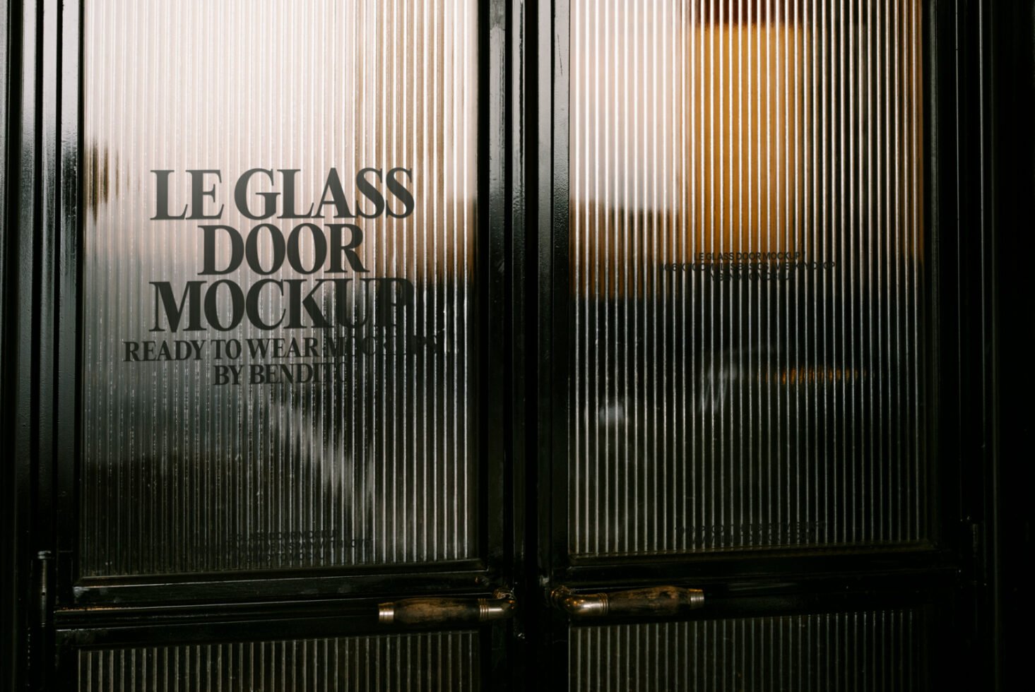 Glass door mockup with sleek handles showcasing vertical lines perfect for designers needing high-quality mockups for architectural or branding projects.