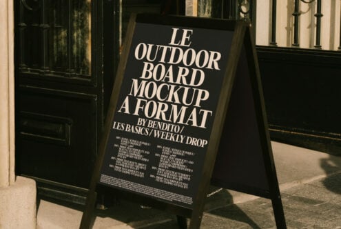 Outdoor signage mockup in A-frame format outside a building. Ideal for designers seeking realistic street display presentations. Keywords: mockup, signage, display