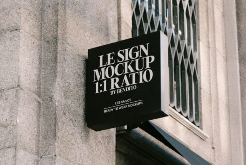 Outdoor sign mockup on building wall featuring 1:1 ratio. Perfect for designers. Keywords: mockup, signage, design, template, exterior, graphic.