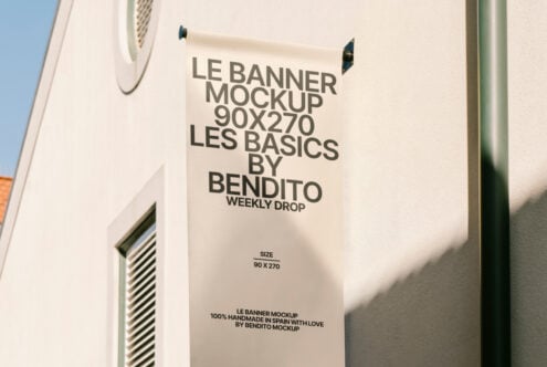 Vertical banner mockup 90x270 on a light building wall for designers. Ideal for showcasing branding, font, graphic, and advertising templates.