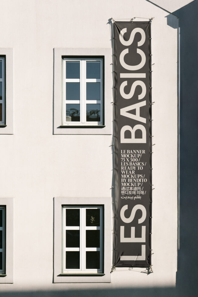 Banner mockup on a white building wall showcasing modern typography design. Perfect for designers in search of high-quality graphic templates.