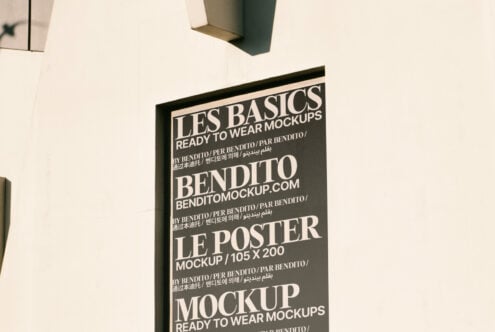 Wall-mounted poster mockup design displayed outdoors, featuring bold typography. Ideal for showcasing branding, marketing campaigns, and graphic design.