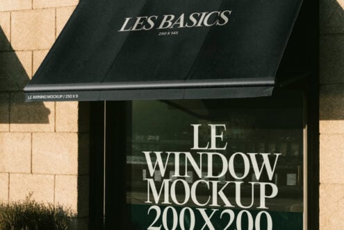 Shopfront awning and window mockup display with Les Basics text. Ideal for designers seeking realistic graphics templates for branding visualizations.