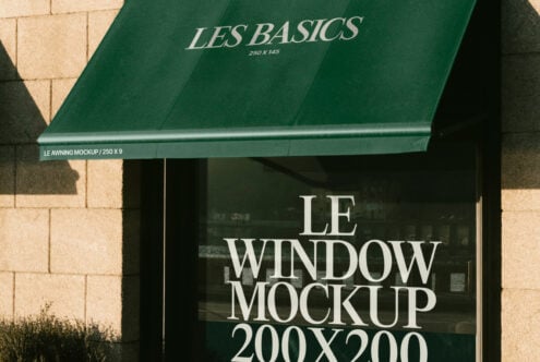 Green retail awning and window mockup display with sample text le window mockup ideal for designers seeking realistic storefront scene mockups.