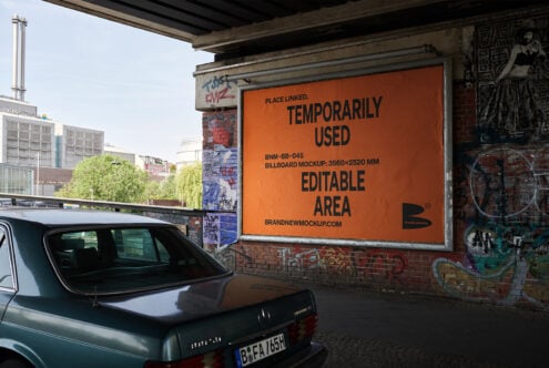 Urban billboard mockup on graffiti-covered wall under bridge editable area for design showcase cityscape background ideal for graphic designers