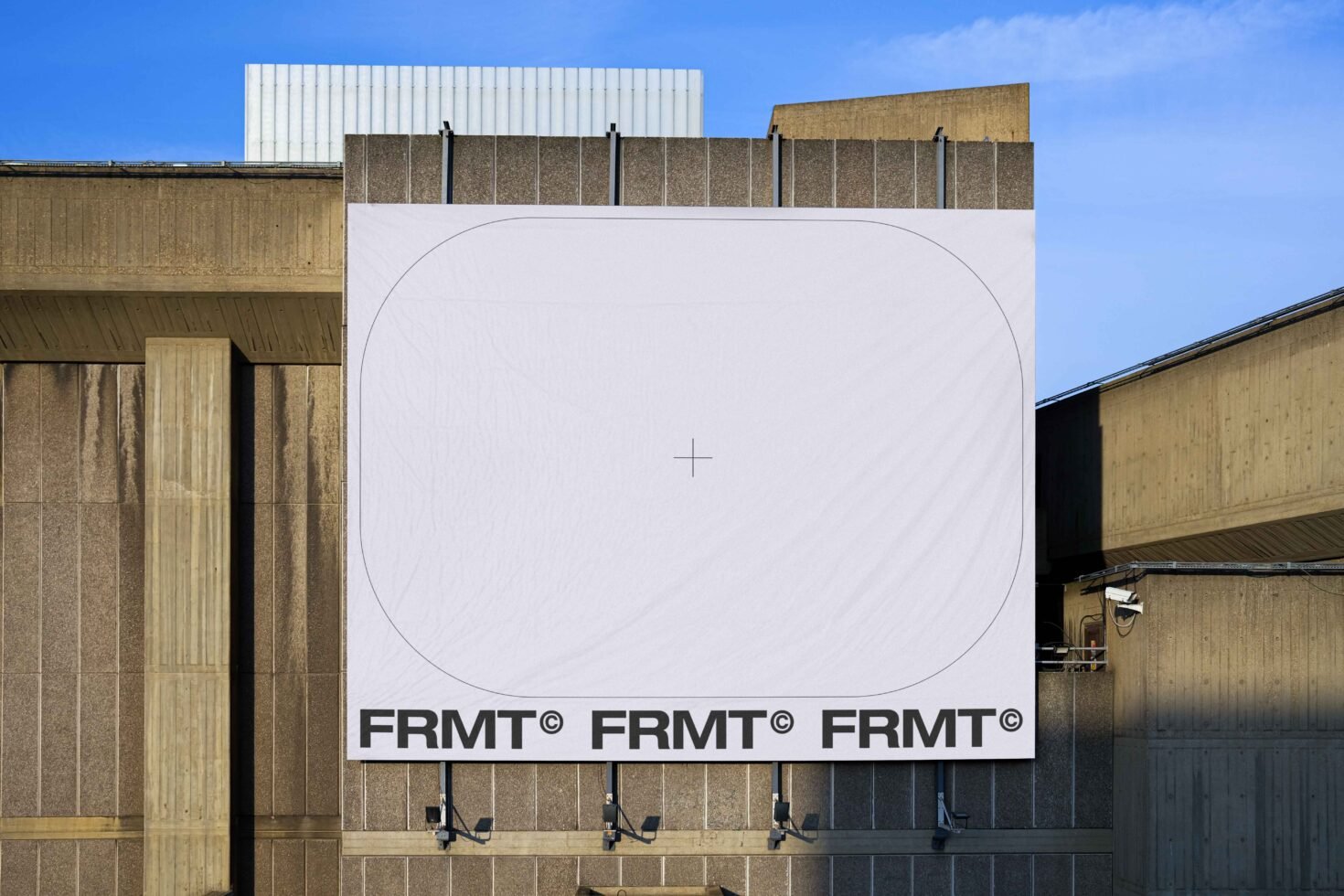Outdoor mockup template on concrete building featuring a large rectangular banner with placeholder text FRMT ideal for designers showcasing branding.
