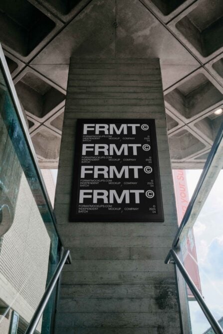 Black poster mockup with four repeated FRMT logos on concrete ceiling shot