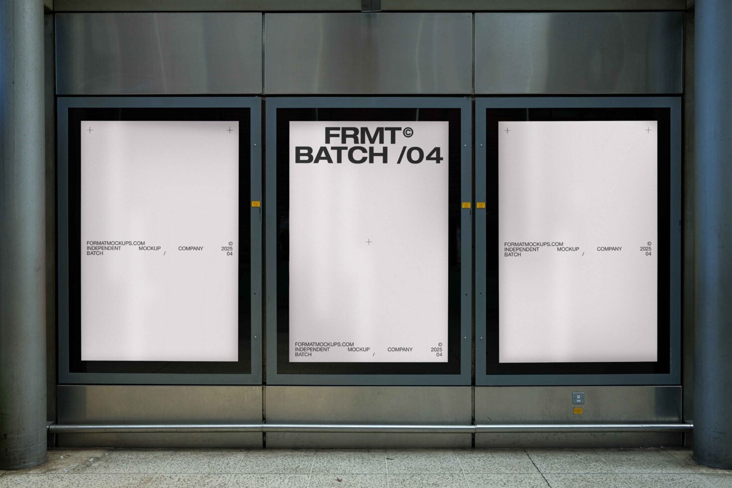 Three framed posters in storefront window with FRMT Batch 04 branding on center display