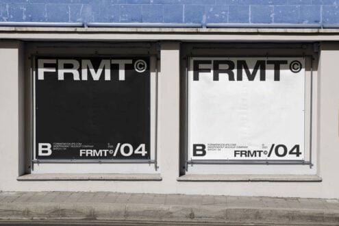 Urban storefront displaying minimalist black and white posters for FRMT mockup designs ideal for graphic designers seeking modern presentation templates.