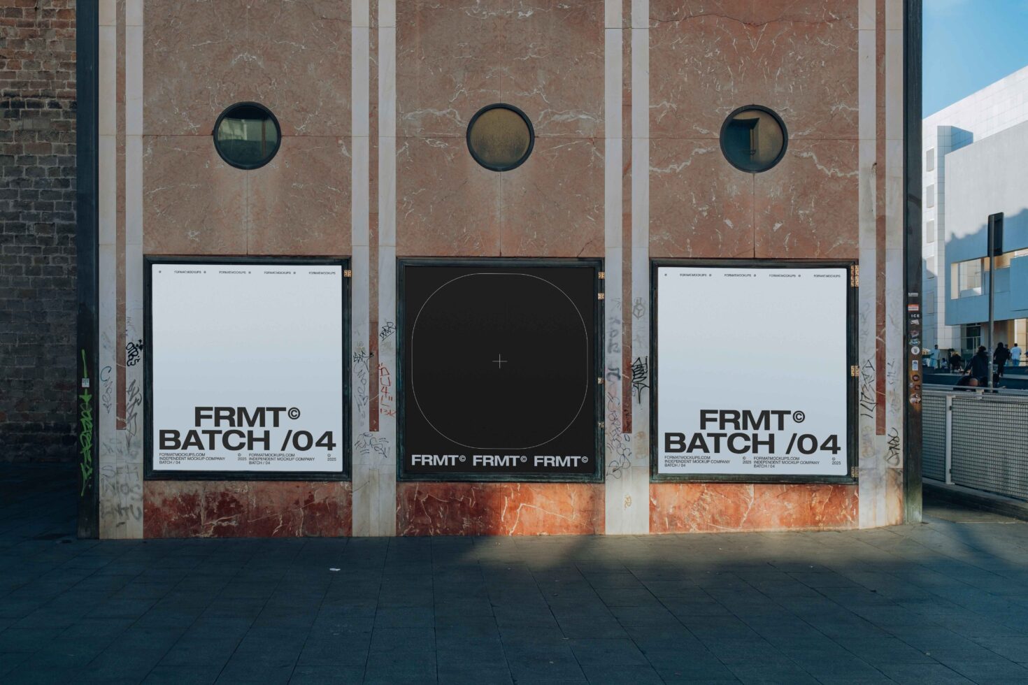 Three square outdoor poster mockups mounted on marbled building facade