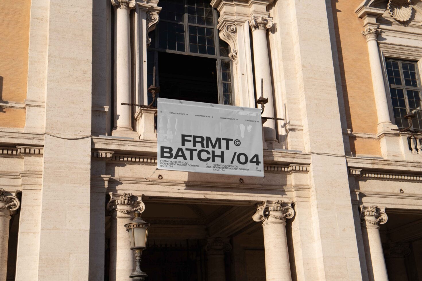 White signage mockup mounted on neoclassical architecture with ionic columns