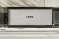 Storefront mockup with large glass window displaying the word Forma in minimalist black font. Perfect for designers seeking modern presentation templates.