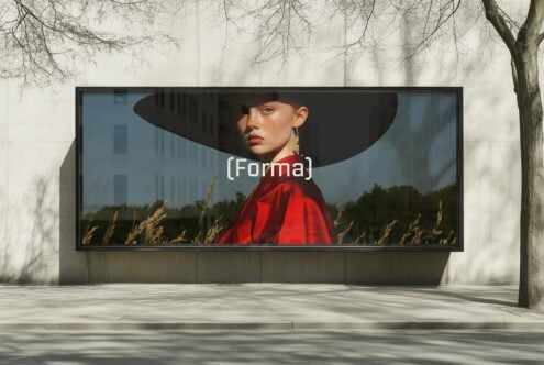 Billboard mockup featuring a fashion model in a red outfit and wide-brimmed hat against a natural background. Ideal for designers seeking classy graphics.
