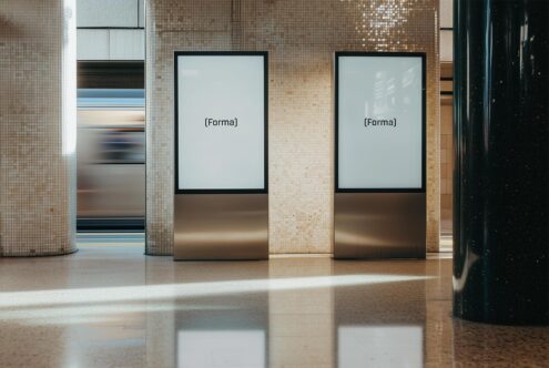 Modern indoor billboard mockup in a subway setting with blurred train motion in background ideal for advertising design templates and graphics presentations.