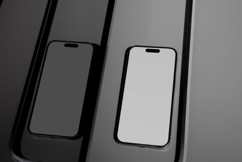 Modern smartphone mockup on a reflective surface with a minimalist design suitable for showcasing app interfaces and digital product templates for designers.