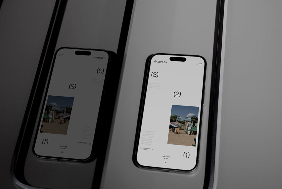 Two iPhones showing website layouts with beach photography on screens