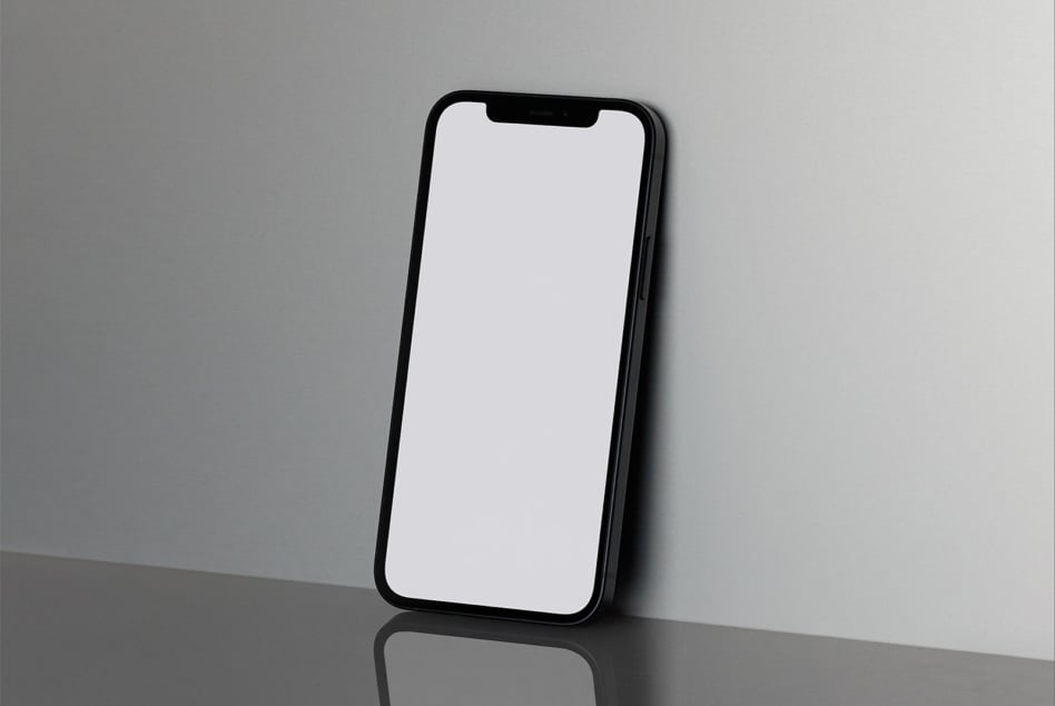 Smartphone mockup with blank screen leaning on a reflective surface perfect for app design presentations digital asset for designers graphic mockups templates