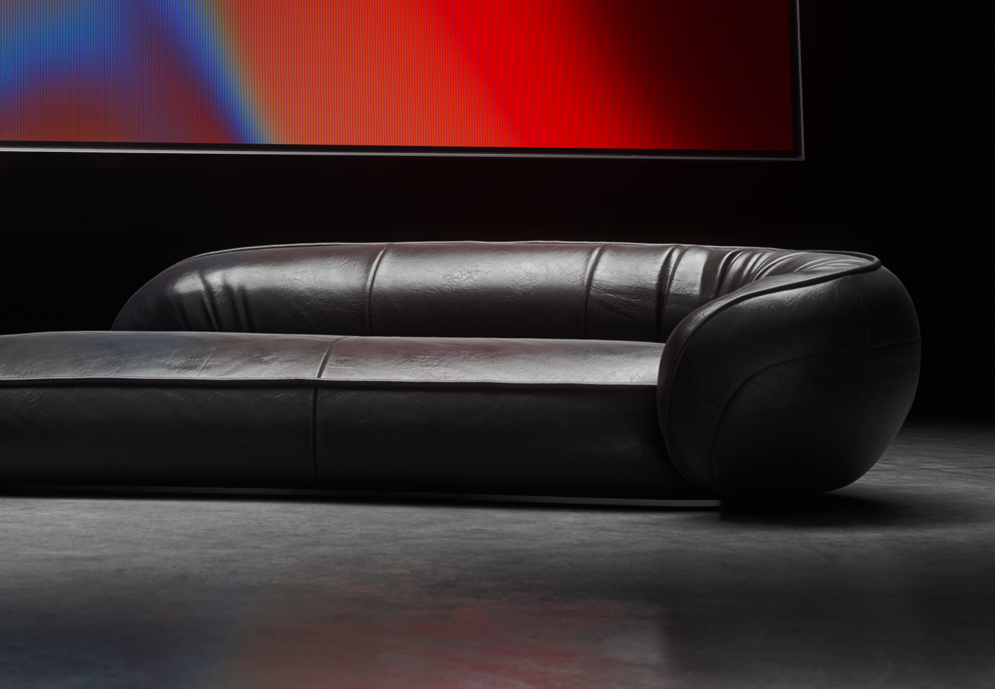 Modern black leather sofa in an elegant interior setting with vibrant red backdrop. Suitable for furniture mockups and interior design graphics.