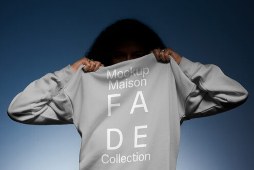 Sweatshirt mockup featuring bold text FADE Collection perfect for branding designers. Create realistic apparel presentations with this high-quality template.