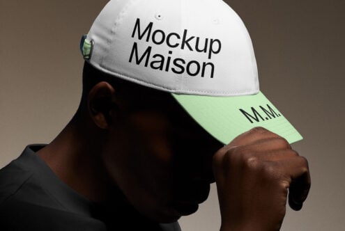 Designer mockup featuring a white and mint green cap with Mockup Maison text perfect for graphic designers high-quality product presentation adjustable hat.