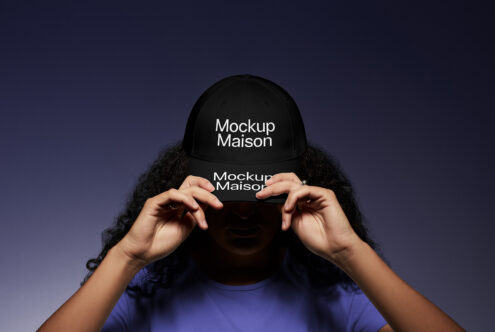 Baseball cap mockup featuring black cap with text design on a dark background perfect for branding and marketing. Editable PSD for graphic designers.