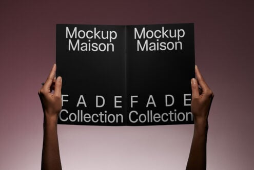 Elegant catalog mockup held by hands against a gradient backdrop, featuring bold typography. Perfect for designers seeking sleek template mockups.