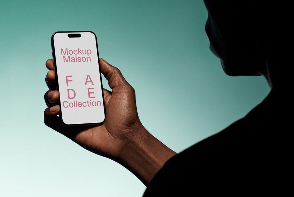 iPhone in hand showing FADE Collection text on teal background