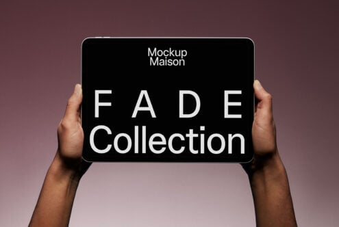 Tablet held by hands displaying text Fade Collection. Minimalistic mockup for digital assets designers. Keywords: mockup, tablet, design, template.