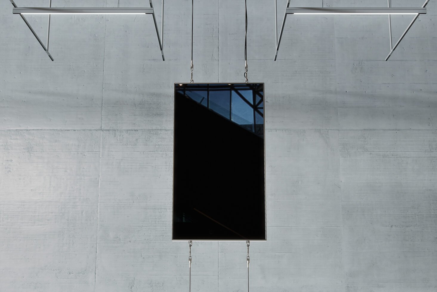 Modern digital screen mockup hanging on a concrete wall background ideal for graphic designers seeking sleek presentation templates in high resolution.