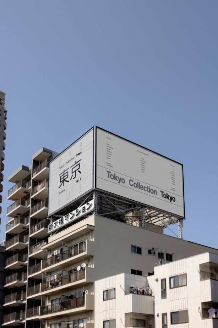 Urban building with a large billboard displaying Tokyo Collection in sleek typography mockup against clear sky ideal for graphic design projects and templates.