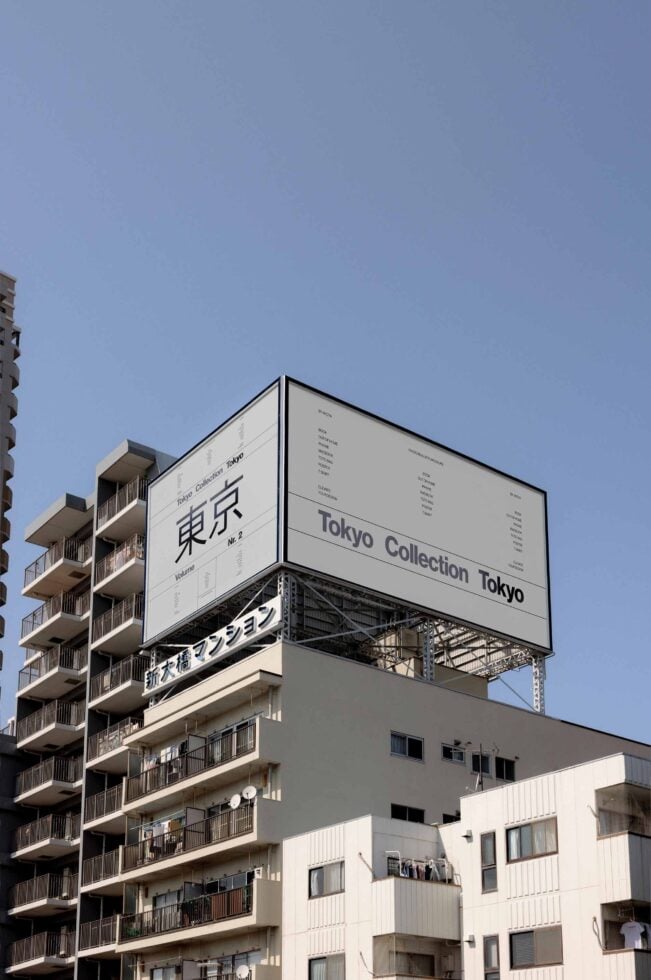 Urban building with a large billboard displaying Tokyo Collection in sleek typography mockup against clear sky ideal for graphic design projects and templates.