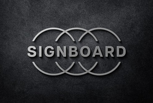 3D metal signboard mockup with overlapping circles on dark textured background suitable for digital design assets signage branding and graphic templates