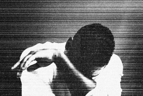 Grainy black and white halftone graphic of person in thought with head resting on arms suitable for design templates digital assets abstract art