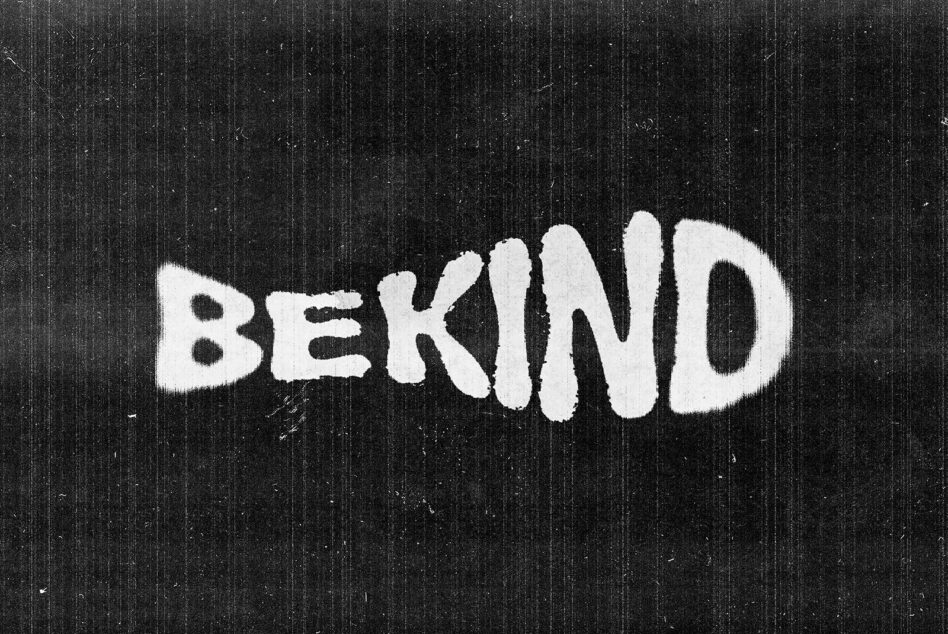 Word bekind in chunky white brush stroke lettering on dark scanlined backdrop