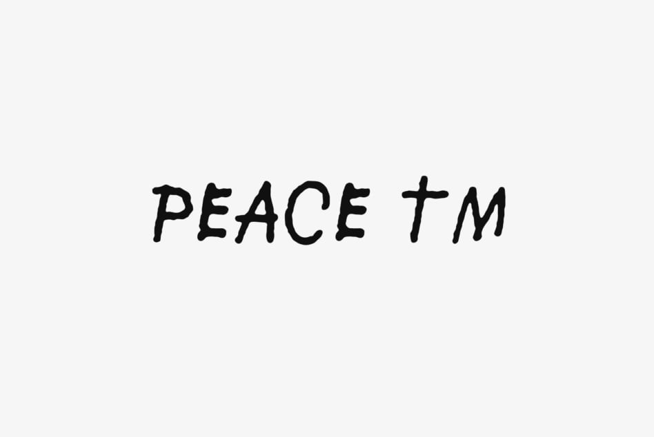 Handwritten Peace TM text in black ink on light gray background