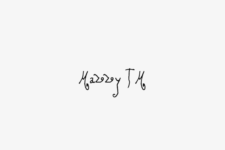 Handwritten cursive text reading Mazzey TM on cream background