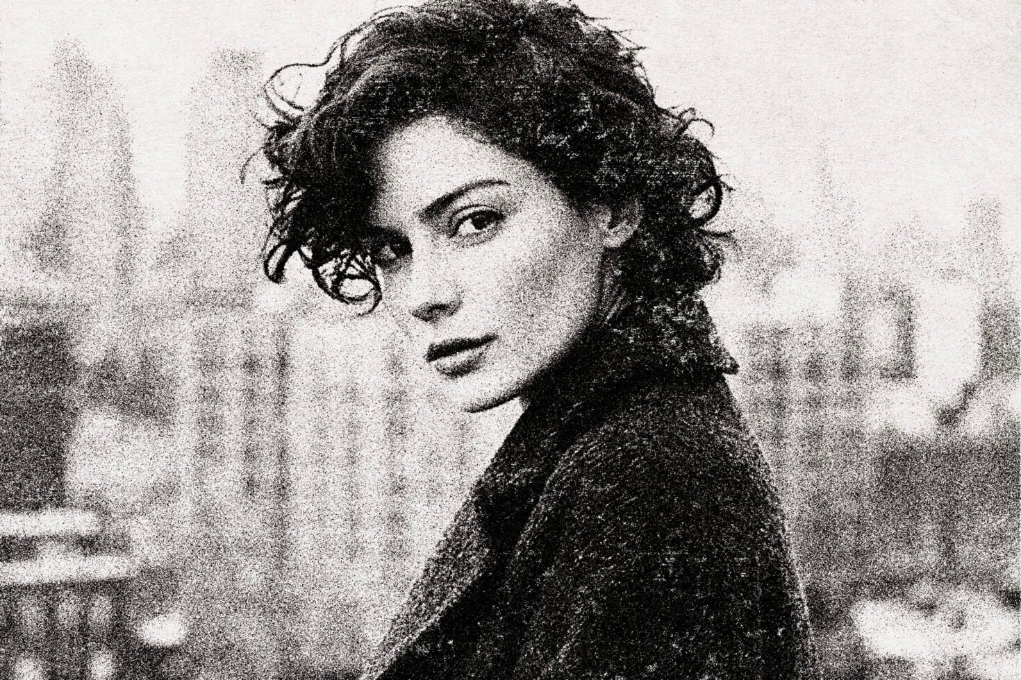 Vintage grainy portrait of a woman with short wavy hair and coat. Perfect for graphic design projects and templates. Retro photography style.