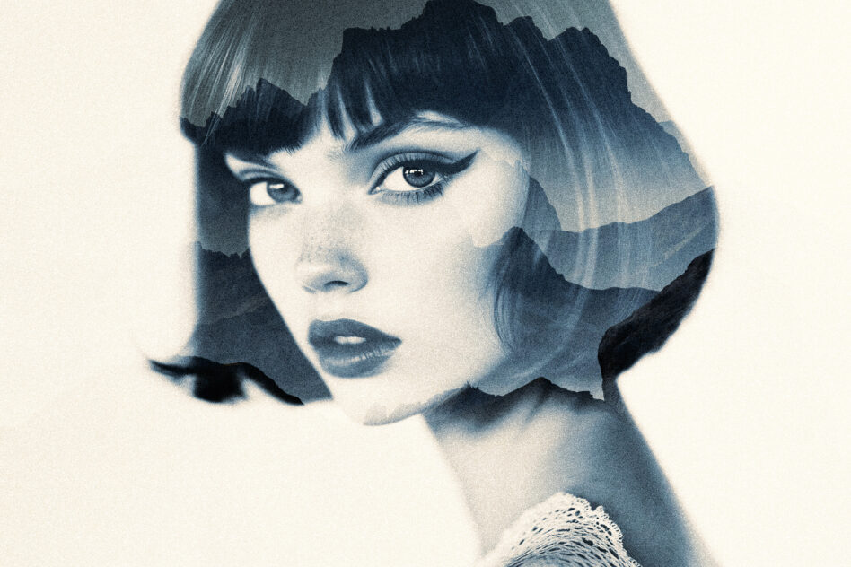Woman's profile in blue tones with mountain shapes creating her hair silhouette