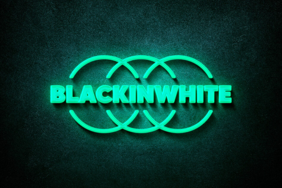 Neon text effect template reading BLACKINWHITE on a textured dark background. Ideal for graphic design projects, mockups, and digital assets.