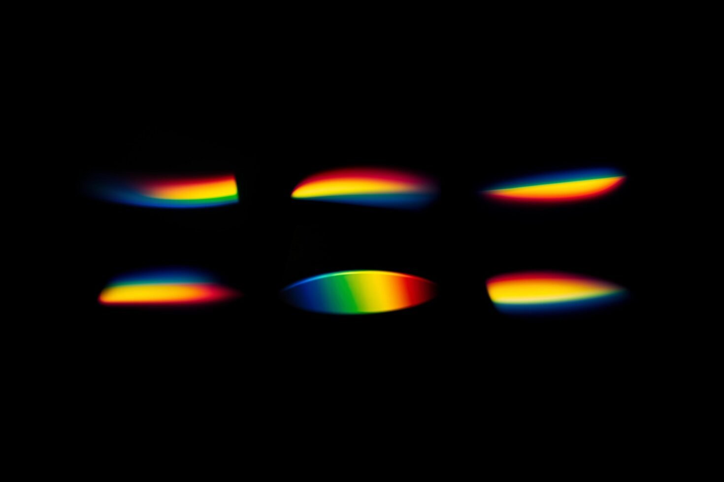 Abstract rainbow reflections on black backdrop. Color spectrum patterns for graphic design projects and creative templates. Vibrant digital asset.