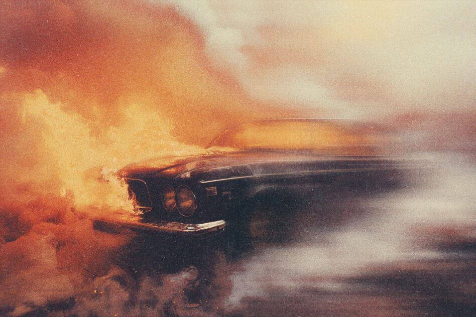 Vintage car on fire with dramatic smoke and flames digital artwork. Ideal for graphic design projects, templates, mockups, and visual effects resources.
