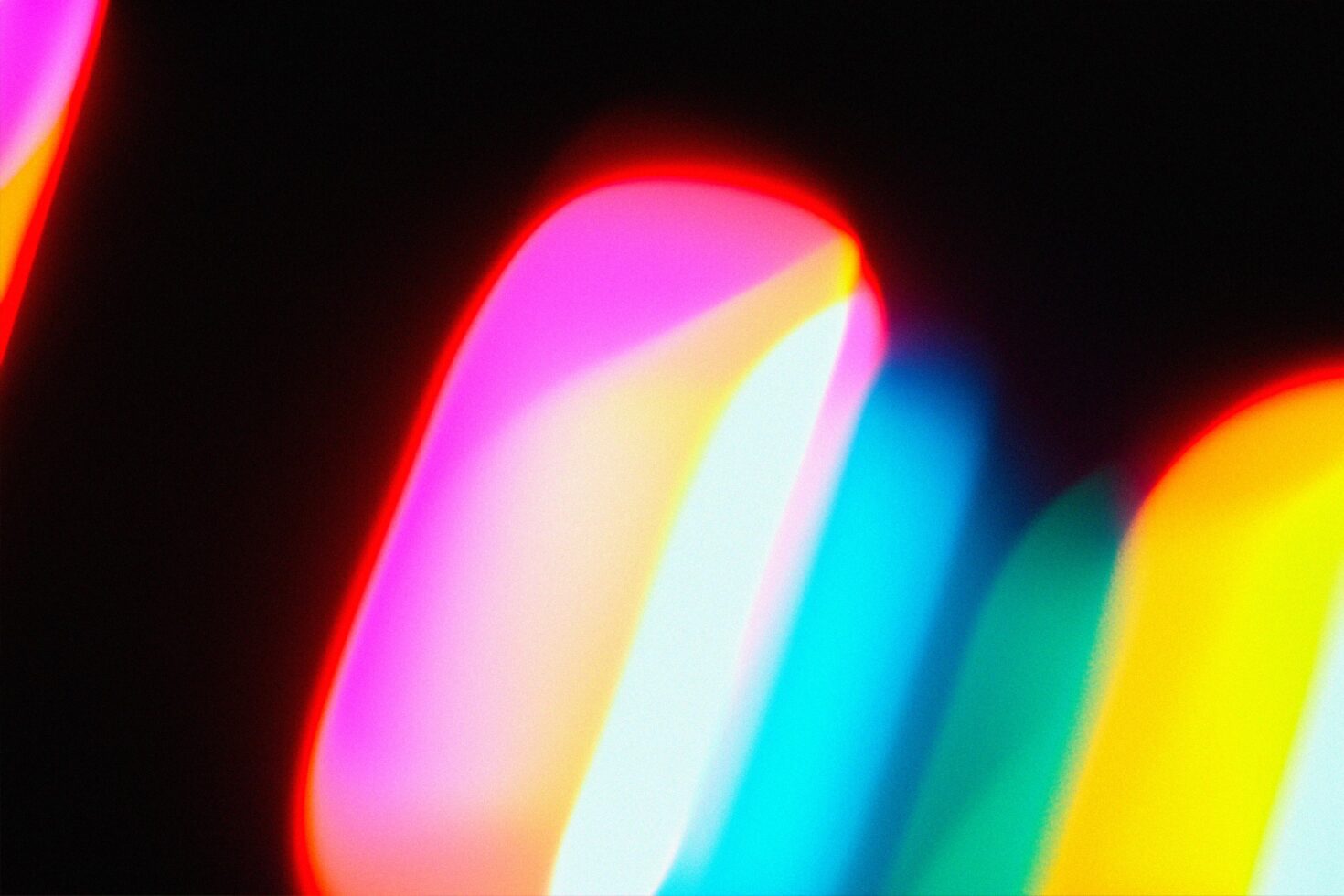 Vibrant abstract light streaks with gradient hues of red blue yellow against a dark backdrop for graphic design backgrounds digital art templates.