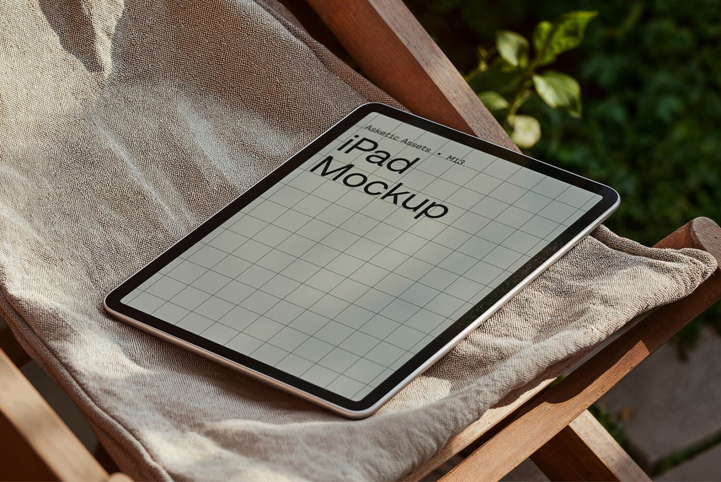 iPad mockup on a fabric surface in natural light showcasing grid layout for design presentations realistic tablet template for designers graphics