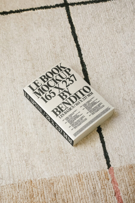 Cream book cover with black serif text reading LE BOOK MOCKUP 165 X 237 BY BENDITO