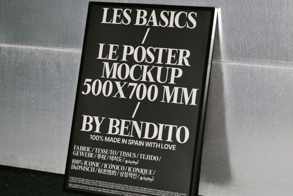 Modern 500x700mm poster mockup displayed in a sleek black frame leaning against a textured wall ideal for designers featuring bold typography