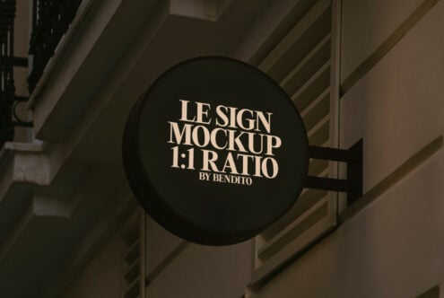 Round sign mockup on building facade in 1:1 ratio for designers suitable for storefront branding visual identity urban signage presentation templates