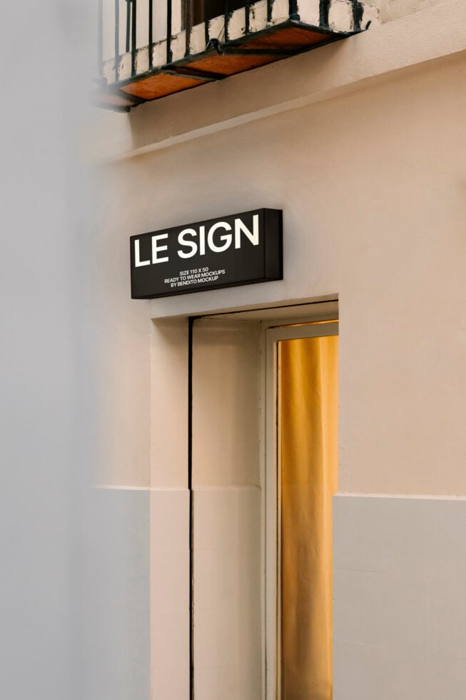 Minimalist building facade with a rectangular illuminated sign saying LE SIGN. Ideal for branding mockups and signage design. Urban aesthetic.