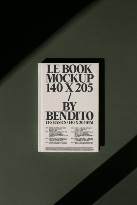 Cream white hardcover book mockup with bold serif text on muted green background