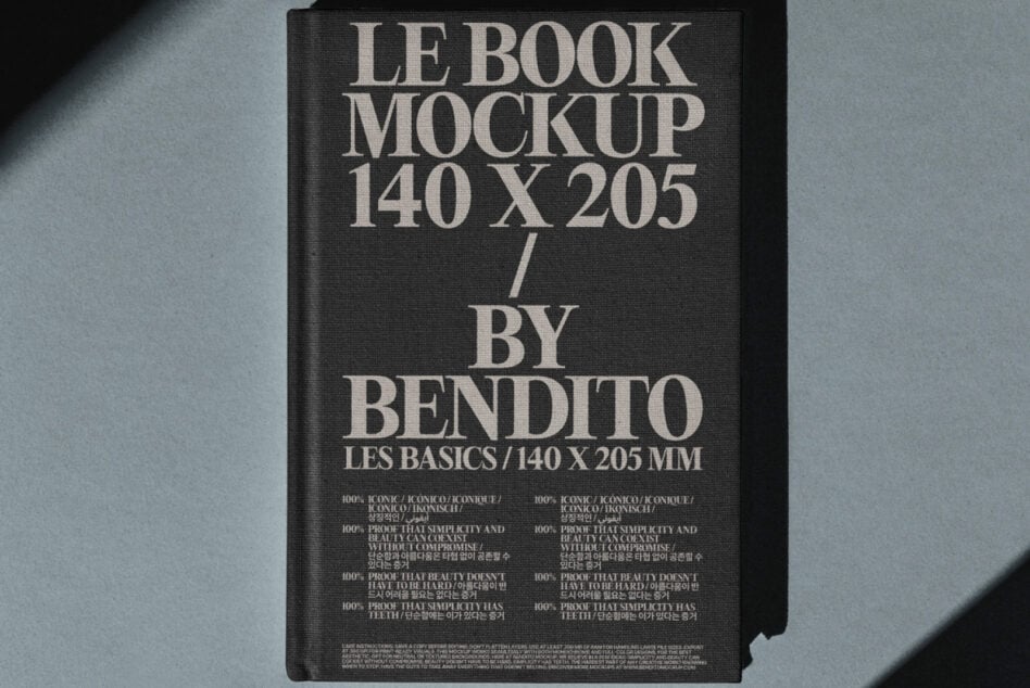 Dark linen book cover mockup with large serif typography, centered composition with lighting
