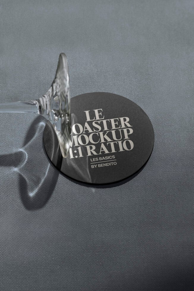 Elegant coaster mockup on textured surface with glass shadow. Ideal for showcasing branding and design projects. Perfect for designers and marketers.
